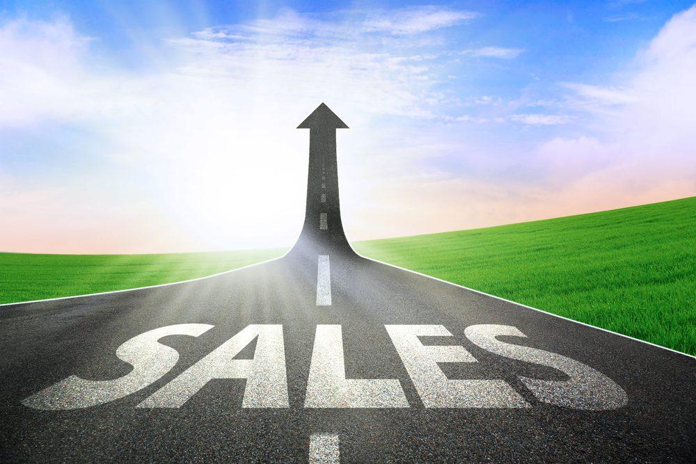 Illustration of a road turning into an upward arrow, symbolising growth in raffle ticket sales